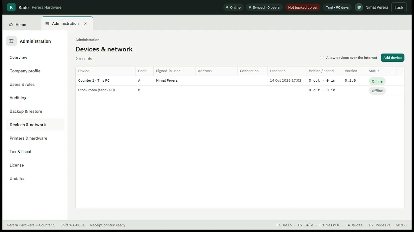 Devices and network screen listing the PCs paired to the business and whether each is online